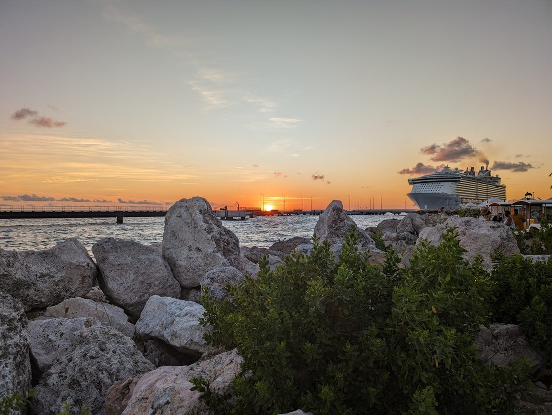 Sunset over Curaçao with cruise ship