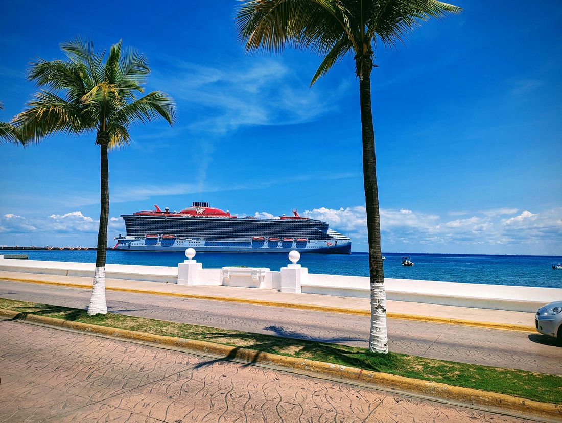 Virgin Voyages ship docked in Cozumel